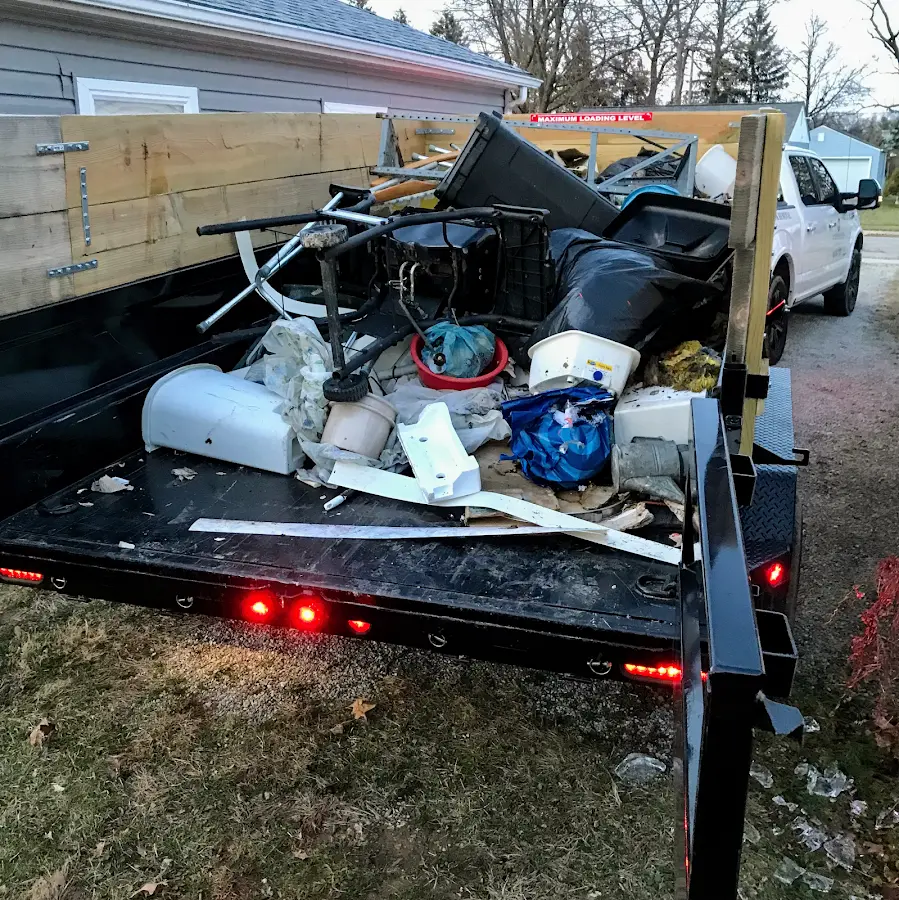 Roll-off dumpster delivered to a residential driveway in Enid